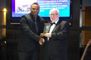 Chair GHA Presented Award to Winner of the Best African Community Group